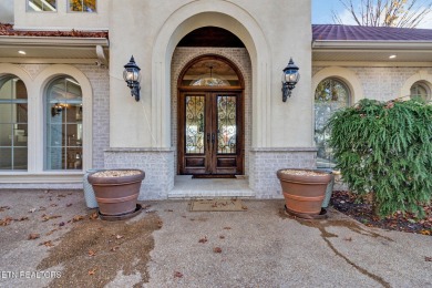 A grand Mediterranean in one of the most coveted locations at on Lake Tansi Village Country Club in Tennessee - for sale on GolfHomes.com, golf home, golf lot