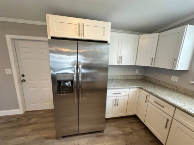 Lot rent is $1037.00    This beautiful 2 bedroom, 2 bathroom on Del Tura Golf and Country Club in Florida - for sale on GolfHomes.com, golf home, golf lot