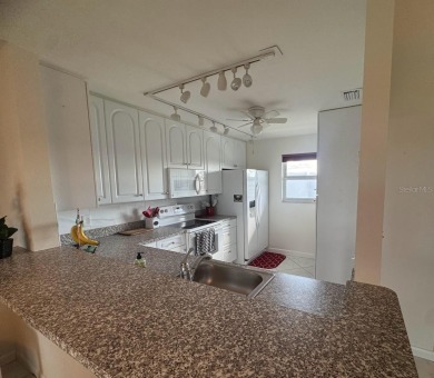 Welcome home! Experience serene golf course living in this on Pinebrook/Ironwood Golf Course in Florida - for sale on GolfHomes.com, golf home, golf lot