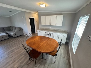 Lot rent is $1037.00    This beautiful 2 bedroom, 2 bathroom on Del Tura Golf and Country Club in Florida - for sale on GolfHomes.com, golf home, golf lot
