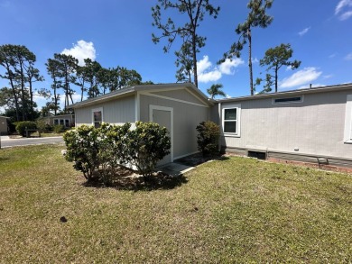Lot rent is $1037.00    This beautiful 2 bedroom, 2 bathroom on Del Tura Golf and Country Club in Florida - for sale on GolfHomes.com, golf home, golf lot