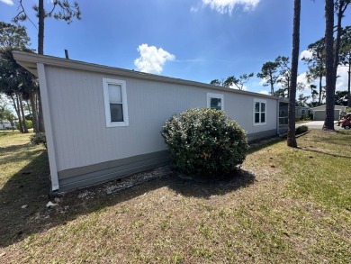 Lot rent is $1037.00    This beautiful 2 bedroom, 2 bathroom on Del Tura Golf and Country Club in Florida - for sale on GolfHomes.com, golf home, golf lot