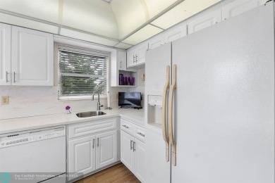 Large, updated corner unit that was originally a 2 bedroom and on Inverrary Country Club in Florida - for sale on GolfHomes.com, golf home, golf lot