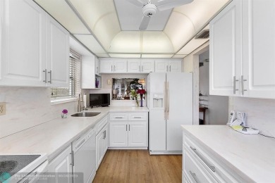 Large, updated corner unit that was originally a 2 bedroom and on Inverrary Country Club in Florida - for sale on GolfHomes.com, golf home, golf lot