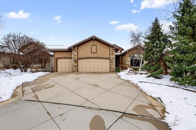 Welcome to this stunning reverse 1.5-story beauty overlooking on Shadow Glen Golf Club in Kansas - for sale on GolfHomes.com, golf home, golf lot