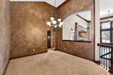 Welcome to this stunning reverse 1.5-story beauty overlooking on Shadow Glen Golf Club in Kansas - for sale on GolfHomes.com, golf home, golf lot