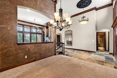 Welcome to this stunning reverse 1.5-story beauty overlooking on Shadow Glen Golf Club in Kansas - for sale on GolfHomes.com, golf home, golf lot