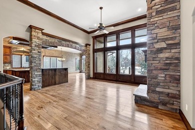 Welcome to this stunning reverse 1.5-story beauty overlooking on Shadow Glen Golf Club in Kansas - for sale on GolfHomes.com, golf home, golf lot