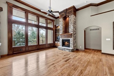 Welcome to this stunning reverse 1.5-story beauty overlooking on Shadow Glen Golf Club in Kansas - for sale on GolfHomes.com, golf home, golf lot