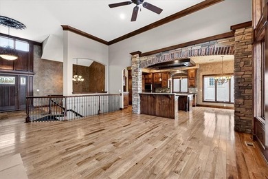 Welcome to this stunning reverse 1.5-story beauty overlooking on Shadow Glen Golf Club in Kansas - for sale on GolfHomes.com, golf home, golf lot