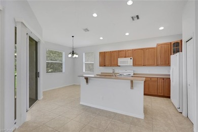 Discover effortless living in this beautifully maintained on Spanish Wells Golf and Country Club in Florida - for sale on GolfHomes.com, golf home, golf lot