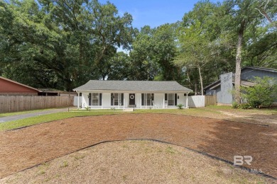 Lovely home in Lake Forest Subdivision. This subdivision offers on Lake Forest Yacht and Country Club in Alabama - for sale on GolfHomes.com, golf home, golf lot