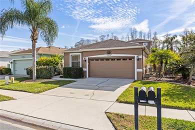 STUNNING Courtyard Home on *PRIVATE CONSERVATION* *With 2 MASTER on The Groves Golf and Country Club in Florida - for sale on GolfHomes.com, golf home, golf lot