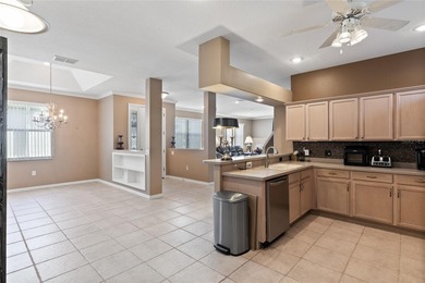 STUNNING Courtyard Home on *PRIVATE CONSERVATION* *With 2 MASTER on The Groves Golf and Country Club in Florida - for sale on GolfHomes.com, golf home, golf lot