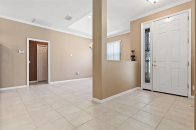 STUNNING Courtyard Home on *PRIVATE CONSERVATION* *With 2 MASTER on The Groves Golf and Country Club in Florida - for sale on GolfHomes.com, golf home, golf lot