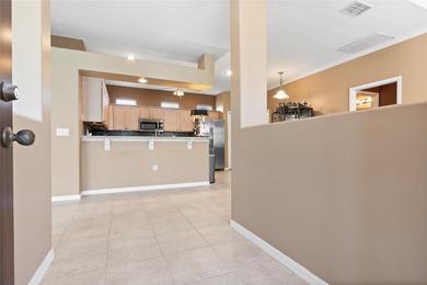 STUNNING Courtyard Home on *PRIVATE CONSERVATION* *With 2 MASTER on The Groves Golf and Country Club in Florida - for sale on GolfHomes.com, golf home, golf lot