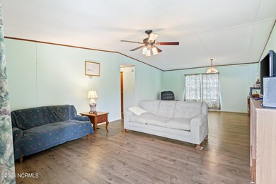 Charming 3 bedroom beach bungalow located in the town of Sunset on Pearl Golf Links in North Carolina - for sale on GolfHomes.com, golf home, golf lot