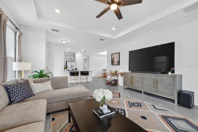 Experience modern luxury and effortless sophistication in this on Esplanade Golf and Country at Lakewood Ranch in Florida - for sale on GolfHomes.com, golf home, golf lot