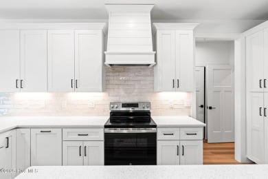 Nestled in the heart of the Shallotte Point area, this home on Rivers Edge Golf Club in North Carolina - for sale on GolfHomes.com, golf home, golf lot