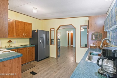 Charming 3 bedroom beach bungalow located in the town of Sunset on Pearl Golf Links in North Carolina - for sale on GolfHomes.com, golf home, golf lot