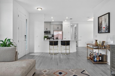 Experience modern luxury and effortless sophistication in this on Esplanade Golf and Country at Lakewood Ranch in Florida - for sale on GolfHomes.com, golf home, golf lot