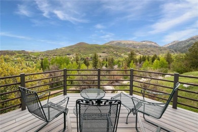 This exceptional 4-bedroom mountain home is perfectly perched on on Rollingstone Ranch Golf Club in Colorado - for sale on GolfHomes.com, golf home, golf lot