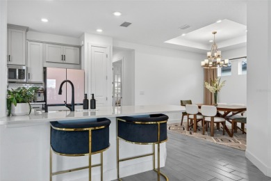 Experience modern luxury and effortless sophistication in this on Esplanade Golf and Country at Lakewood Ranch in Florida - for sale on GolfHomes.com, golf home, golf lot