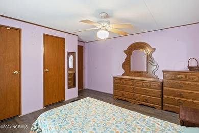 Charming 3 bedroom beach bungalow located in the town of Sunset on Pearl Golf Links in North Carolina - for sale on GolfHomes.com, golf home, golf lot