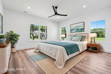 Nestled in the heart of the Shallotte Point area, this home on Rivers Edge Golf Club in North Carolina - for sale on GolfHomes.com, golf home, golf lot