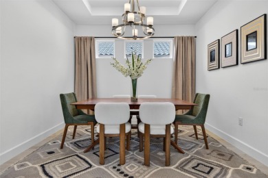 Experience modern luxury and effortless sophistication in this on Esplanade Golf and Country at Lakewood Ranch in Florida - for sale on GolfHomes.com, golf home, golf lot