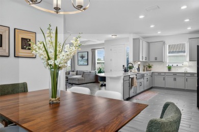 Experience modern luxury and effortless sophistication in this on Esplanade Golf and Country at Lakewood Ranch in Florida - for sale on GolfHomes.com, golf home, golf lot