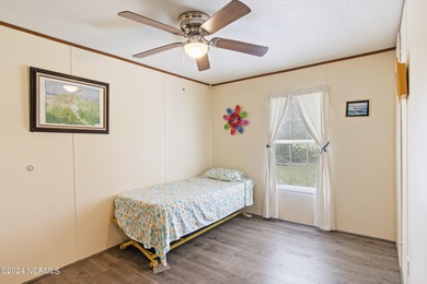 Charming 3 bedroom beach bungalow located in the town of Sunset on Pearl Golf Links in North Carolina - for sale on GolfHomes.com, golf home, golf lot