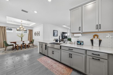 Experience modern luxury and effortless sophistication in this on Esplanade Golf and Country at Lakewood Ranch in Florida - for sale on GolfHomes.com, golf home, golf lot