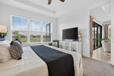 Experience modern luxury and effortless sophistication in this on Esplanade Golf and Country at Lakewood Ranch in Florida - for sale on GolfHomes.com, golf home, golf lot
