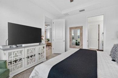 Experience modern luxury and effortless sophistication in this on Esplanade Golf and Country at Lakewood Ranch in Florida - for sale on GolfHomes.com, golf home, golf lot