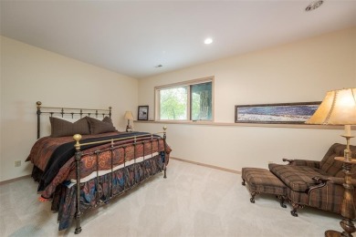 This exceptional 4-bedroom mountain home is perfectly perched on on Rollingstone Ranch Golf Club in Colorado - for sale on GolfHomes.com, golf home, golf lot