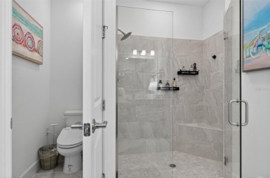 Experience modern luxury and effortless sophistication in this on Esplanade Golf and Country at Lakewood Ranch in Florida - for sale on GolfHomes.com, golf home, golf lot