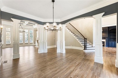 Stunning elegance overlooking the 14th green in gated White on White Columns Country Club in Georgia - for sale on GolfHomes.com, golf home, golf lot