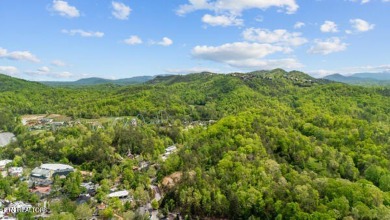 Here is an amazing opportunity to get your 2-bedroom, 2-bathroom on Gatlinburg Golf Course in Tennessee - for sale on GolfHomes.com, golf home, golf lot