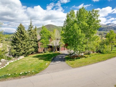 This exceptional 4-bedroom mountain home is perfectly perched on on Rollingstone Ranch Golf Club in Colorado - for sale on GolfHomes.com, golf home, golf lot