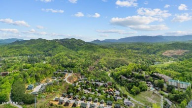 Here is an amazing opportunity to get your 2-bedroom, 2-bathroom on Gatlinburg Golf Course in Tennessee - for sale on GolfHomes.com, golf home, golf lot