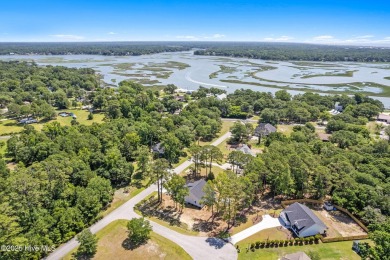 Nestled in the heart of the Shallotte Point area, this home on Rivers Edge Golf Club in North Carolina - for sale on GolfHomes.com, golf home, golf lot