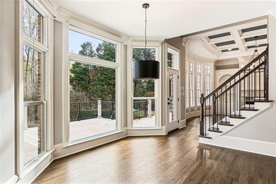 Stunning elegance overlooking the 14th green in gated White on White Columns Country Club in Georgia - for sale on GolfHomes.com, golf home, golf lot