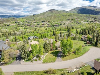 This exceptional 4-bedroom mountain home is perfectly perched on on Rollingstone Ranch Golf Club in Colorado - for sale on GolfHomes.com, golf home, golf lot