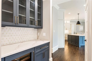 Stunning elegance overlooking the 14th green in gated White on White Columns Country Club in Georgia - for sale on GolfHomes.com, golf home, golf lot