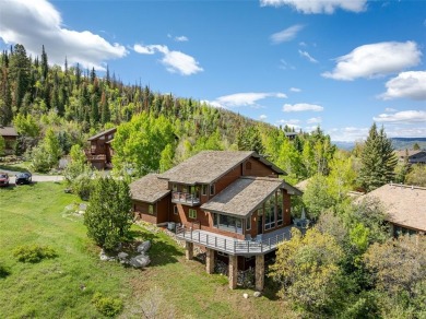 This exceptional 4-bedroom mountain home is perfectly perched on on Rollingstone Ranch Golf Club in Colorado - for sale on GolfHomes.com, golf home, golf lot