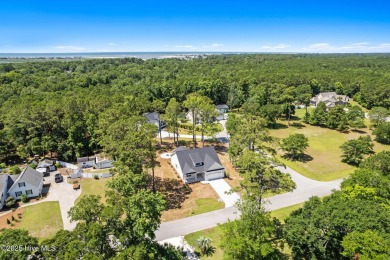 Nestled in the heart of the Shallotte Point area, this home on Rivers Edge Golf Club in North Carolina - for sale on GolfHomes.com, golf home, golf lot
