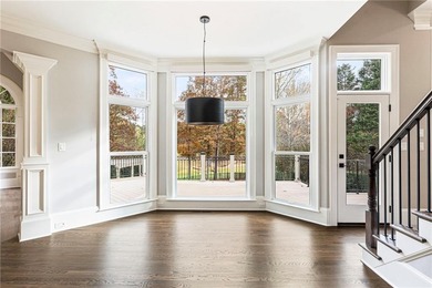 Stunning elegance overlooking the 14th green in gated White on White Columns Country Club in Georgia - for sale on GolfHomes.com, golf home, golf lot