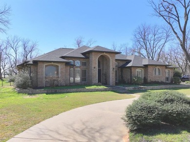 Beautifully situated on 2.3 private acres in the gated, golfing on Pecan Plantation Country Club in Texas - for sale on GolfHomes.com, golf home, golf lot