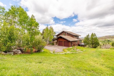 This exceptional 4-bedroom mountain home is perfectly perched on on Rollingstone Ranch Golf Club in Colorado - for sale on GolfHomes.com, golf home, golf lot